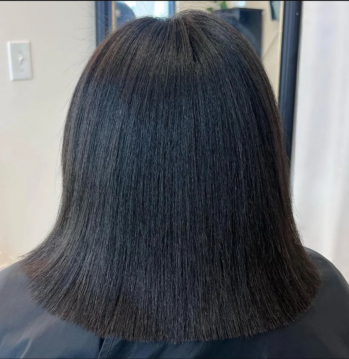 Flat iron sleek silk press & precision trim on textured hair in Arlington, Texas.
